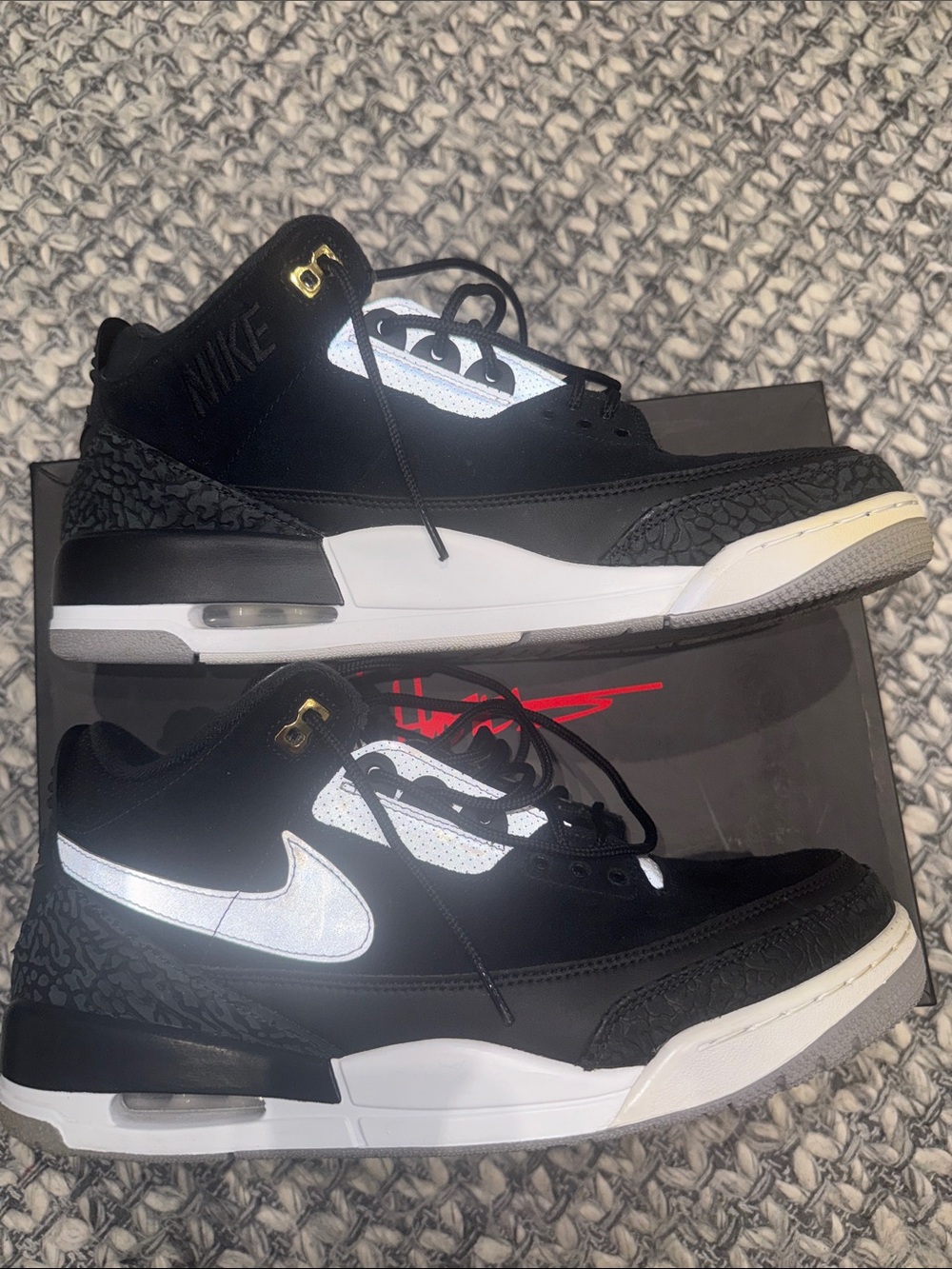 Air Jordan 3 Tinker “Black Cement” sneakers.
Men’s size 13